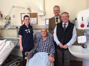Rotary President Martin Phillips and Rotarian Chris Breakwell present a cheque to Nevill Hall Hospital as thanks for the treatment of Rotarian Chris Breakwell during recent heart problems